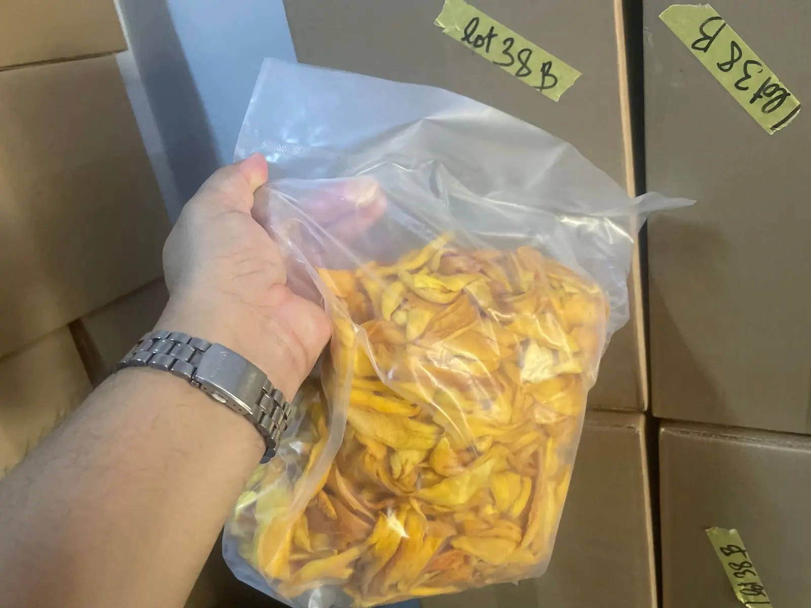 Sachet scellé de mangue séchée de qualité export — image d’illustration, et non la photographie d’une installation réalisée